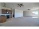 Wet bar with dark wood cabinets and granite countertop at 40105 N 2Nd Way, Phoenix, AZ 85086