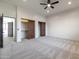 Comfortable bedroom with carpet flooring and wooden closets at 40105 N 2Nd Way, Phoenix, AZ 85086