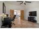 Home office with built in cabinets and view to living room at 40105 N 2Nd Way, Phoenix, AZ 85086
