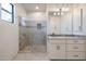 Bathroom boasts a walk-in shower, white cabinets, and a tiled floor at 40105 N 2Nd Way, Phoenix, AZ 85086