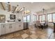 Kitchen features an island, dining area, and views to the backyard at 40105 N 2Nd Way, Phoenix, AZ 85086