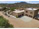 Two-story house with three car garage and desert landscaping at 40105 N 2Nd Way, Phoenix, AZ 85086