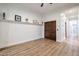 Bright bedroom featuring wood flooring and sliding doors at 40105 N 2Nd Way, Phoenix, AZ 85086