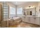 Elegant bathroom with a soaking tub and double vanity at 40105 N 2Nd Way, Phoenix, AZ 85086