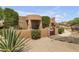 View of a gorgeous desert home with a gated entrance and nicely landscaped yard at 40105 N 2Nd Way, Phoenix, AZ 85086