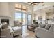 Spacious living room featuring a fireplace and access to a patio with mountain views at 40105 N 2Nd Way, Phoenix, AZ 85086