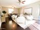 Bright dining room with hardwood floors and seating area at 1311 S Ponderosa Dr, Gilbert, AZ 85296