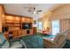 Spacious loft with built-in entertainment center and seating area at 7240 N Dreamy Draw Dr # 113, Phoenix, AZ 85020