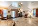 Bright living room featuring a fireplace and access to the patio at 7240 N Dreamy Draw Dr # 113, Phoenix, AZ 85020