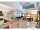 High-ceiling living room with a loft and elegant staircase at 7240 N Dreamy Draw Dr # 113, Phoenix, AZ 85020
