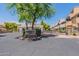 Gated entrance to The Legends community with landscaping at 7240 N Dreamy Draw Dr # 113, Phoenix, AZ 85020