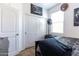 Bedroom with double door closet and window with blinds at 2040 N Ensenada Ln, Casa Grande, AZ 85122