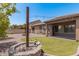 Backyard with fire pit and string lights at 3407 E Glacier Pl, Chandler, AZ 85249