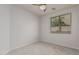 Simple bedroom with neutral walls and carpet, ceiling fan at 3407 E Glacier Pl, Chandler, AZ 85249