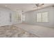 Spacious living room with tile flooring and neutral decor at 3407 E Glacier Pl, Chandler, AZ 85249