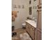 Bright bathroom with light wood cabinets and a tiled shower/tub combo at 815 N Hayden Rd # B2, Scottsdale, AZ 85257