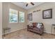 Cozy game room featuring a brown couch and game-themed decor at 3058 E Spring Wheat Ln, Gilbert, AZ 85296