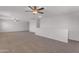 Spacious loft with carpet, ceiling fans, and an open floorplan at 22706 N 17Th St, Phoenix, AZ 85024