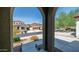 View of neighborhood homes and mountains from covered entryway at 7351 W Palo Brea Ln, Peoria, AZ 85383