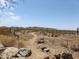 A desert landscape with a trail leading to mountains at 7351 W Palo Brea Ln, Peoria, AZ 85383