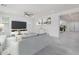 Bright and airy living room with a view of the entryway at 2848 E Presidio St, Mesa, AZ 85213