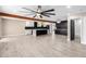 Spacious living room with wood beam ceiling and open floor plan at 1236 E Mclellan Blvd, Phoenix, AZ 85014