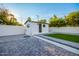 Backyard with a detached studio and artificial turf at 1236 E Mclellan Blvd, Phoenix, AZ 85014