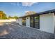 Updated backyard with artificial turf, pavers, and a pool at 1236 E Mclellan Blvd, Phoenix, AZ 85014