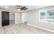 Light and airy bedroom with ceiling fan and access to another room at 1236 E Mclellan Blvd, Phoenix, AZ 85014