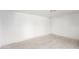 Empty room with white walls and neutral tile floors at 1236 E Mclellan Blvd, Phoenix, AZ 85014