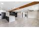Modern kitchen with large island, marble countertops, and dark cabinetry at 1236 E Mclellan Blvd, Phoenix, AZ 85014