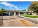 Mid-century modern home with artificial turf and updated landscaping at 1236 E Mclellan Blvd, Phoenix, AZ 85014
