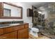 Elegant bathroom with granite vanity and large walk-in shower at 6900 E Princess Dr # 2221, Phoenix, AZ 85054