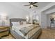 Bright bedroom with a king-size bed and ensuite access at 6900 E Princess Dr # 2221, Phoenix, AZ 85054