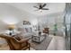 Relaxing living room with ample natural light and comfortable seating at 6900 E Princess Dr # 2221, Phoenix, AZ 85054