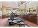 Modern fitness center with treadmills and weight equipment at 6900 E Princess Dr # 2221, Phoenix, AZ 85054
