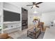Bright living area with a fireplace and open concept to kitchen at 6900 E Princess Dr # 2221, Phoenix, AZ 85054