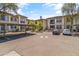 Apartment building with parking and landscaping at 6900 E Princess Dr # 2221, Phoenix, AZ 85054
