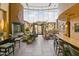 Spacious community room with a fireplace and comfortable seating at 6900 E Princess Dr # 2221, Phoenix, AZ 85054