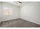 Simple bedroom with carpet flooring and window shutters at 3051 W Sousa Ct, Anthem, AZ 85086