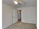 Spacious bedroom with ceiling fan and neutral carpeting at 30629 N Royal Oak Way, San Tan Valley, AZ 85143