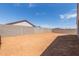 Large backyard with block wall and sandy ground at 25226 N 131St Dr, Peoria, AZ 85383