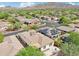 Aerial view of a house and neighborhood with mountain views at 2939 W Plum Hollow Dr, Anthem, AZ 85086