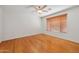 Bedroom with hardwood floors and ceiling fan at 2939 W Plum Hollow Dr, Anthem, AZ 85086