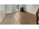 Living room with tile and wood-look floors, and a fireplace at 2617 W Willow Ave, Phoenix, AZ 85029