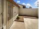 Private patio with wrought iron gate and small garden area at 2617 W Willow Ave, Phoenix, AZ 85029