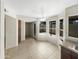Bright dining area with tile floors and access to a patio at 2617 W Willow Ave, Phoenix, AZ 85029