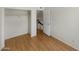 Bright bedroom with wood-look floors and spacious closet at 2617 W Willow Ave, Phoenix, AZ 85029