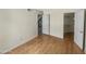 Bright bedroom with wood floors and spacious closet at 2617 W Willow Ave, Phoenix, AZ 85029