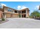 Two-story home with three-car garage and desert landscaping at 2425 W Bronco Butte Trl # 2017, Phoenix, AZ 85085